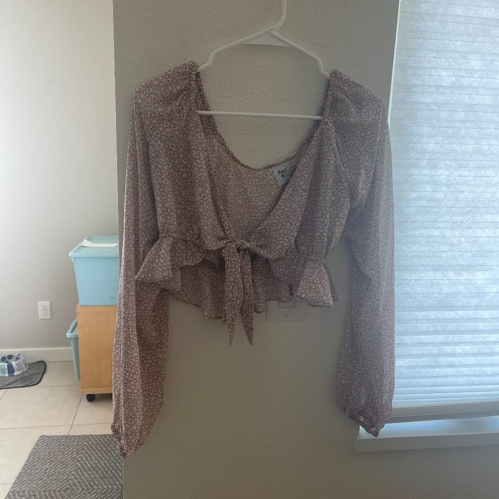 Princess Polly long sleeve top in slightly sheer light pink with front tie